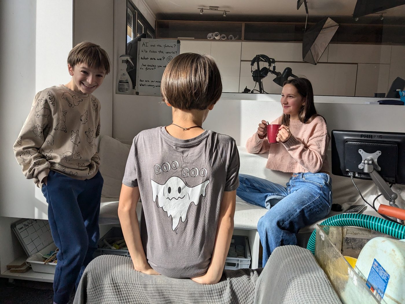 Children using English in a real social moment inside the TwoFish environment.